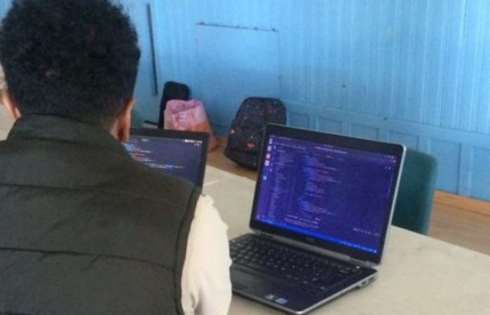 Refugees in a coding school in Glasgow